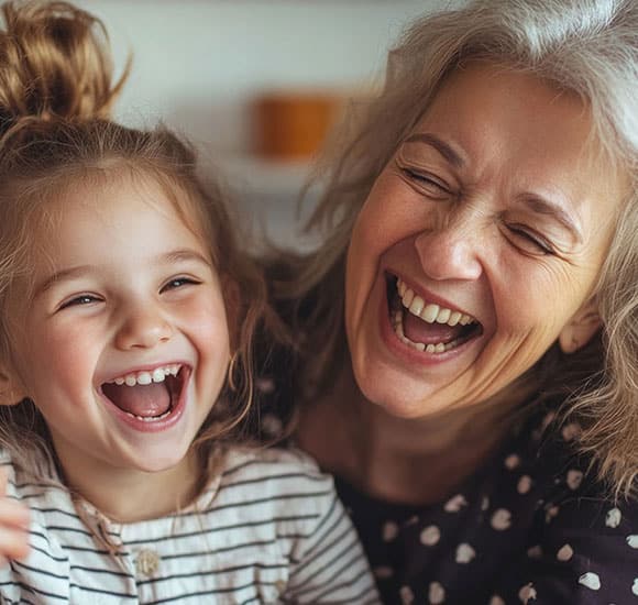 woman-little-girl-laughing-together